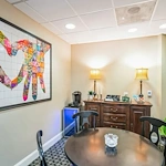 Barclay House of Tarboro senior living community offering independent living, assisted living, and memory care in Tarboro, NC, sitting area with a table and refreshments