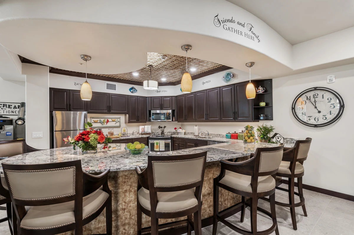Wilshire Estates Gracious Retirement Living, independent living in Silver Spring, MD, community kitchen with countertop and barstool seating
