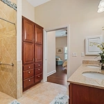 Brightmore of South Charlotte senior living community offering independent living, assisted living, and memory care in Charlotte, NC, apartment bathroom with tiled walk in shower