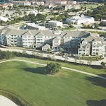 Pioneer Ridge Gracious Retirement Living Hawthorn Senior Independent Living in McKinney, Texas front exterior drone view