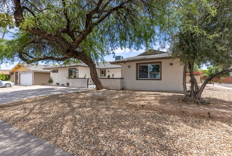 Legato Living Residential Memory Care at Old Town senior living community offering assisted living and memory care in Scottsdale, AZ, front exterior with large trees in view