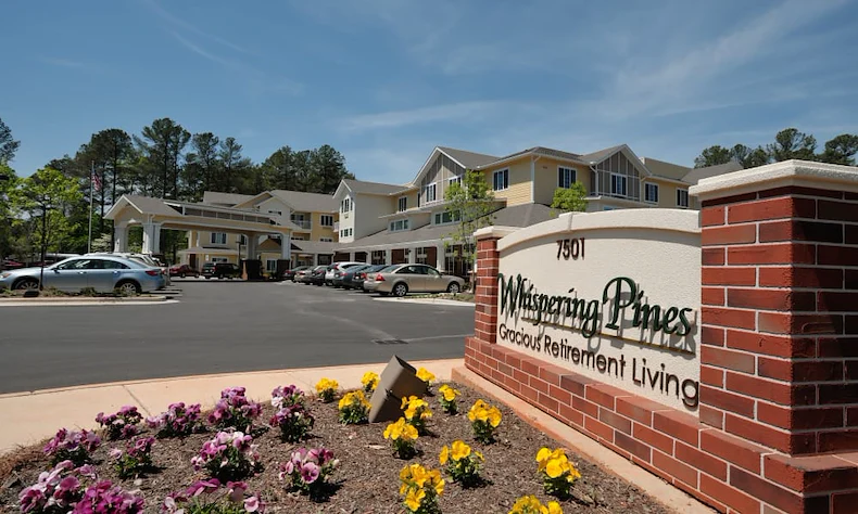 Whispering Pines Gracious Retirement Living Hawthorn Senior Independent Living in Raleigh, North Carolina front exterior welcome sign