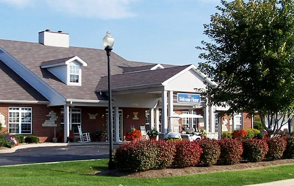 Rosegate Assisted Senior Living and Garden Homes in Indianapolis, IN front exterior entrance with welcome home sign