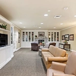 Assisted living and memory care at Belleview Heights Senior Living in Aurora, CO, sitting area by a TV
