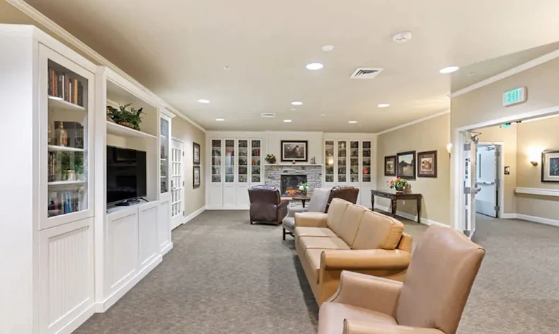 Assisted living and memory care at Belleview Heights Senior Living in Aurora, CO, sitting area by a TV