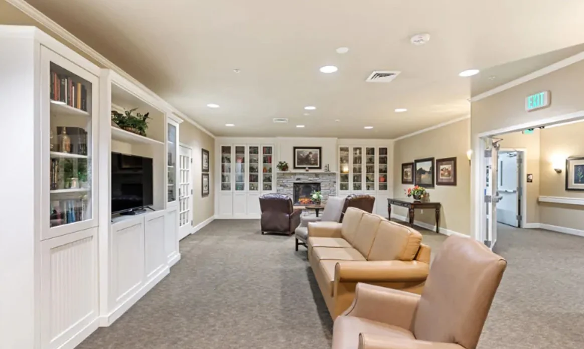 Assisted living and memory care at Belleview Heights Senior Living in Aurora, CO, sitting area by a TV