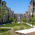 Active adult living and independent living at Watercrest at Shadow Creek Ranch in Pearland, TX, outdoor green space with a walking path