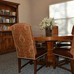 Rosegate Assisted Senior Living and Garden Homes in Indianapolis, IN library with bookshelf