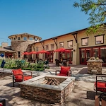Woodbridge Terrace of Irvine, independent living, assisted living, and memory care in Irvine, CA, exterior with seating area