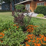 Legato Living Residential Memory Care at Eastridge senior living community offering assisted living, memory care, adult day services, and respite care in Omaha, NE, exterior with nice landscaping