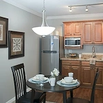 Allegro Fleming Island, senior living community offering independent living, assisted living, memory care, and respite care in Fleming Island, FL, apartment featuring a kitchenette and dining area