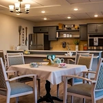 Independent living, assisted living, memory care, and respite care at Broadwell Senior Living – Plymouth in Plymouth, MN, community kitchen and dining area