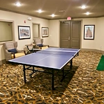 Active adult living and independent living at Watercrest at Shadow Creek Ranch in Pearland, TX, activities room featuring a ping pong table