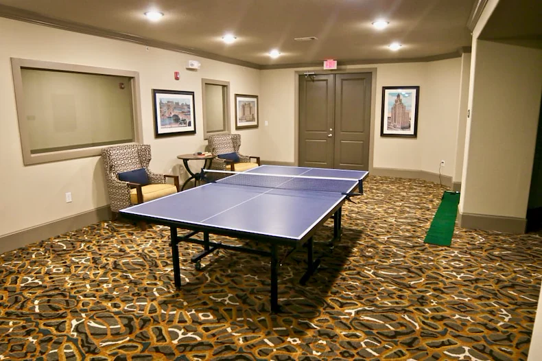Active adult living and independent living at Watercrest at Shadow Creek Ranch in Pearland, TX, activities room featuring a ping pong table