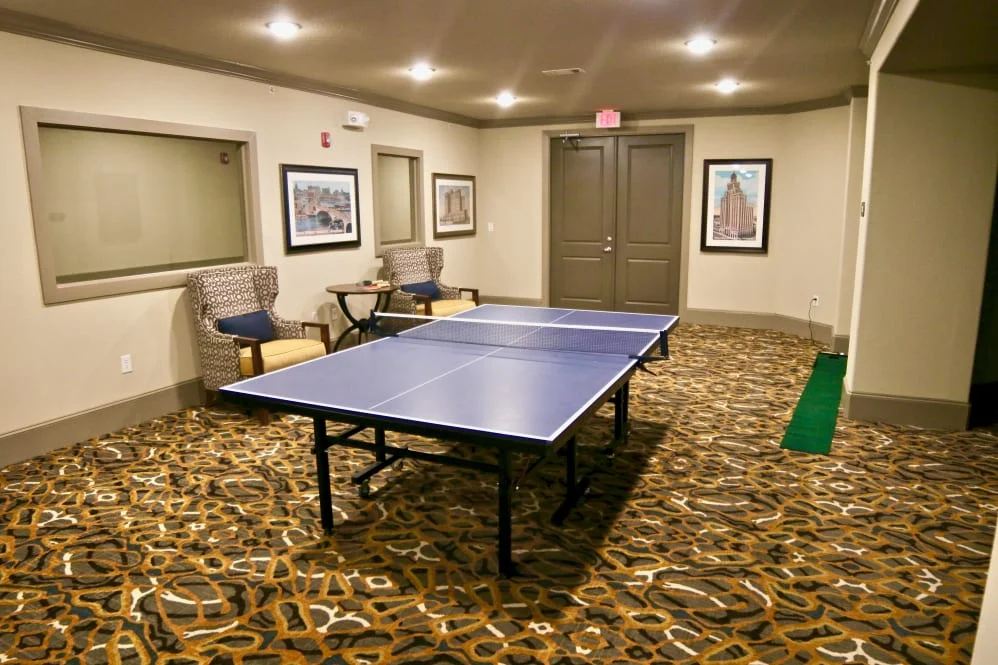 Active adult living and independent living at Watercrest at Shadow Creek Ranch in Pearland, TX, activities room featuring a ping pong table