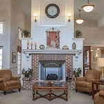 Charter Senior Living of Bowie sitting area by fireplace