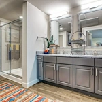 Watermere at Round Rock senior living community offering active adult living and independent living in Round Rock, TX, apartment bathroom with a double vanity