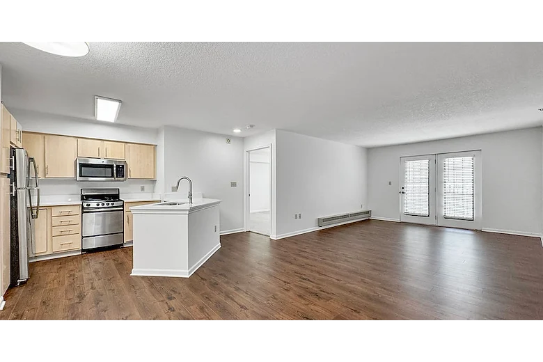 Sage Independence, Independent Living in Des Moines, IA newly renovated unfurnished apartment kitchen and living room