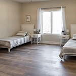 Legato Living Residential Memory Care at Five Fountains senior living community offering assisted living, memory care, adult day services, and respite care in Elkhorn, NE, shared suite with two beds and two nightstands