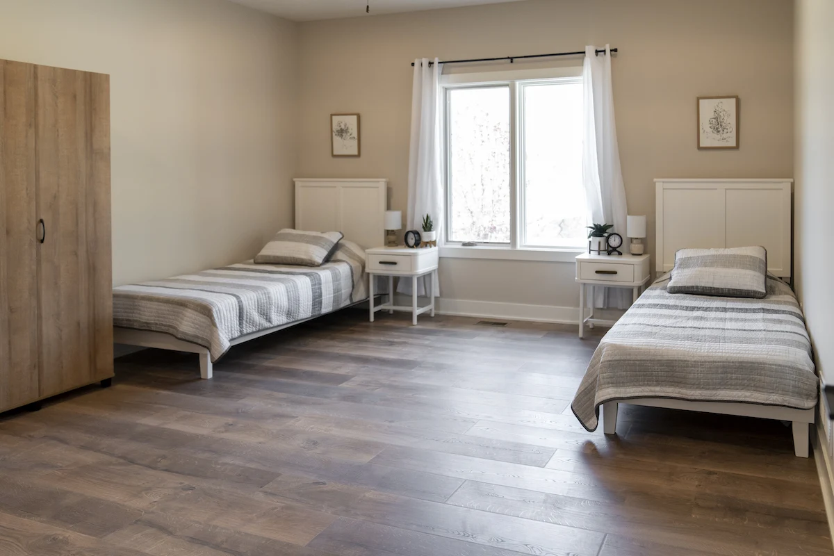 Legato Living Residential Memory Care at Five Fountains senior living community offering assisted living, memory care, adult day services, and respite care in Elkhorn, NE, shared suite with two beds and two nightstands