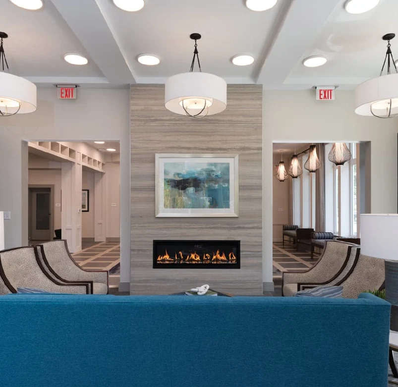 KindCare at Bristol, CT, sitting area by fireplace