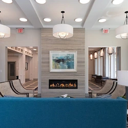 KindCare at Bristol, CT, sitting area by fireplace