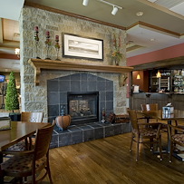 Covenant Living at Inverness in Tulsa, OK, visiting area by fireplace