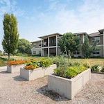 Wenatchee Senior Living by Cogir senior living community offering independent living, assisted living, and respite care in Wenatchee, WA, outdoor area with garden beds