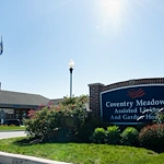 Coventry Meadows Senior Living in Fort Wayne, IN front exterior entrance sign that reads "Coventry Meadows Assisted Living And Garden Homes"