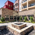 Alexis Estates Gracious Retirement Living by Hawthorn Senior Living, independent living in Allen, TX, rear exterior and outdoor gathering area