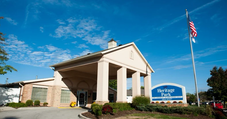 Heritage Park Assisted Senior Living & Garden Homes in Fort Wayne, IN front exterior entrance and welcome sign