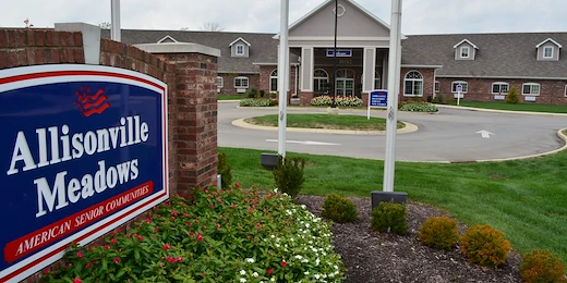 Allisonville Meadows Assisted Living offering assisted living, memory care, and respite care in Fishers, IN, front exterior driveway and entrance sign