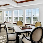Bear Hollow Estates Hawthorn Senior Independent Living in Rancho Cordova, California, table in the game room with a chess board