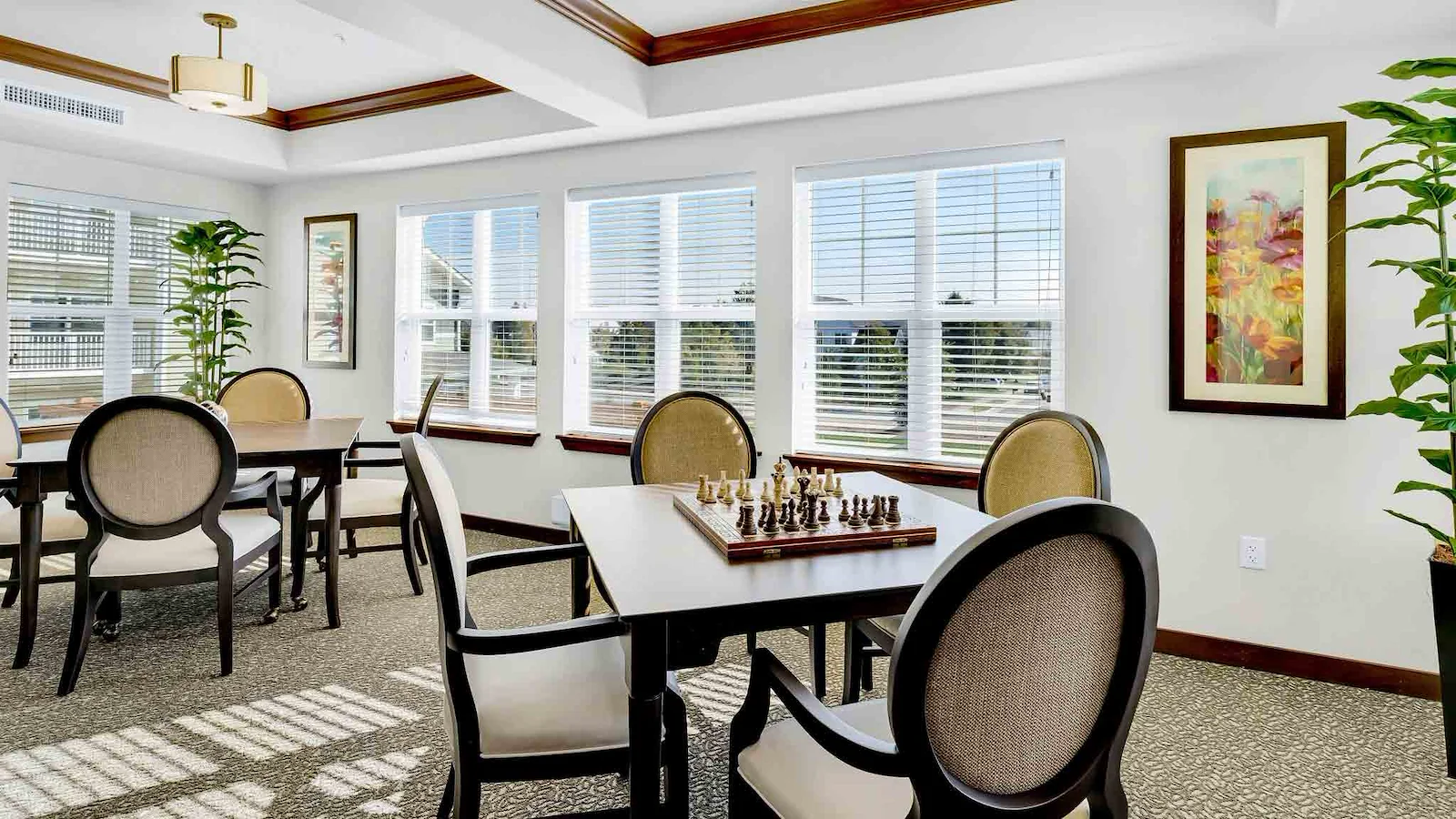 Bear Hollow Estates Hawthorn Senior Independent Living in Rancho Cordova, California, table in the game room with a chess board