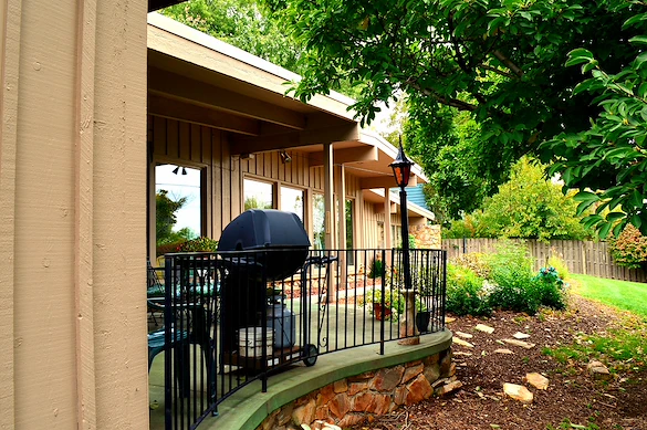 Legato Living Residential Memory Care at Eastridge senior living community offering assisted living, memory care, adult day services, and respite care in Omaha, NE, back patio with seating and a grill