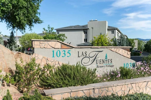 Independent living, assisted living, and memory care at Las Fuentes Resort Village in Prescott, AZ, community entrance sign