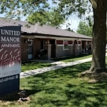 United Manor independent senior living in DeWitt, Iowa front entrance sign
