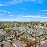 Stone Lodge Gracious Retirement Living Hawthorn Senior independent Living in Bend, Oregon front exterior drone view