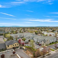 Stone Lodge Gracious Retirement Living Hawthorn Senior independent Living in Bend, Oregon front exterior drone view