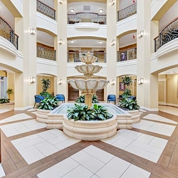 Allegro Boynton Beach, senior living community offering independent living, assisted living, memory care, and respite care in Boynton Beach, FL, lobby with fountain