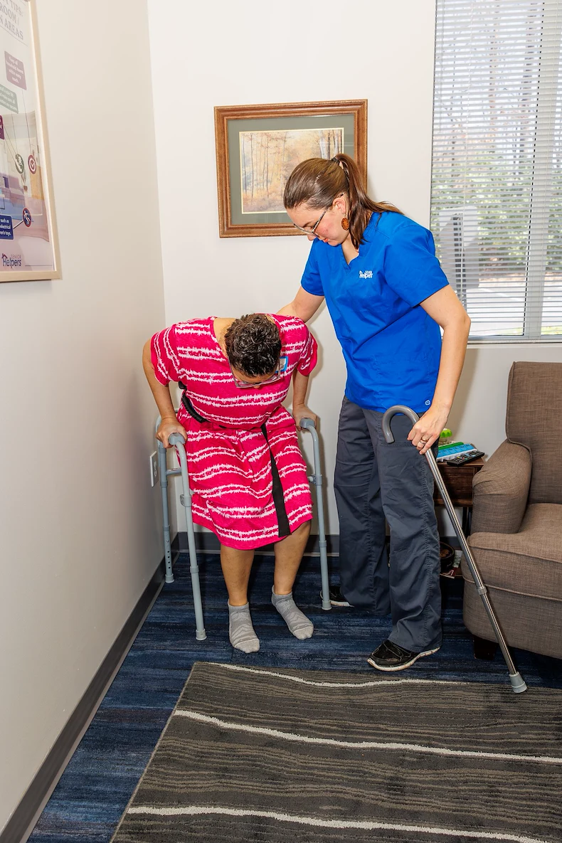 Caregivers practice skills in our Center of Excellence, a training space designed as a realistic simulation of a client’s home. Training occurring here helps caregivers identify hazardous items, learn more about the safety of a client’s home, and demonstrate the proper use of durable medical equipment (DME), so caregivers can better assist with mobility, transfers, bathing, and toileting assistance. 