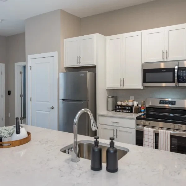 Acclaim at Cary Pointe, senior living community offering active adult and independent living in Cary, NC, modern apartment kitchen