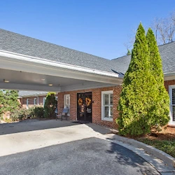 Assisted living, memory care, and respite care at Bethel Gardens in Powder Springs, GA, front exterior and entrance