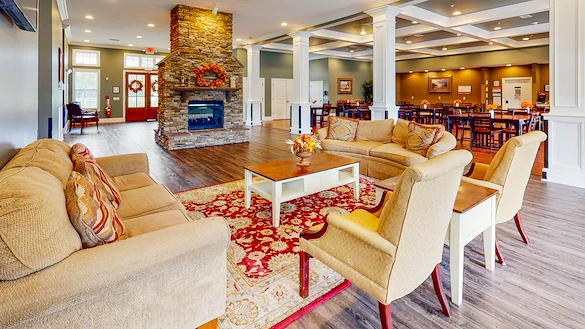 Orchard Ridge's indoor lounge area and fireplace