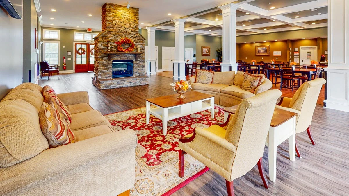 Orchard Ridge's indoor lounge area and fireplace