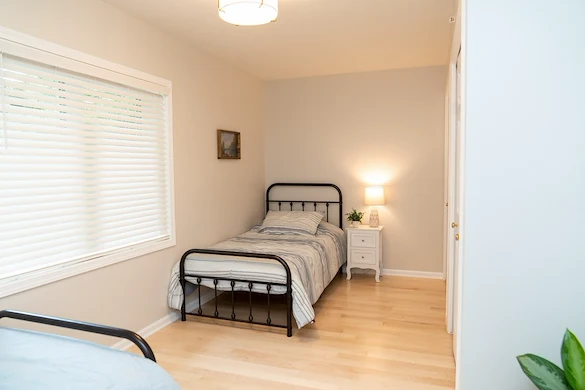 Legato Living Residential Memory Care at Rockbrook senior living community offering assisted living and memory care in Omaha, NE, shared suite with warm lighting