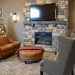 The Legacy of DeForest, WI, entry way and sitting area with fireplace
