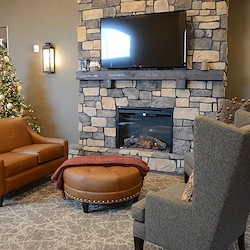 The Legacy of DeForest, WI, entry way and sitting area with fireplace