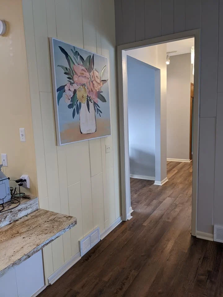 Legato Living Residential Memory Care at Eastridge senior living community offering assisted living, memory care, adult day services, and respite care in Omaha, NE, interior view looking down the hallway toward resident bedrooms