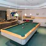 Las Fuentes Resort Village senior living in Prescott, AZ offering independent living, assisted living, and memory care, activities room featuring a pool table